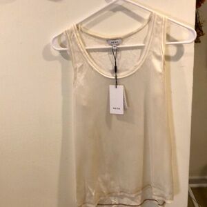 Woman’s brand new  white silk top